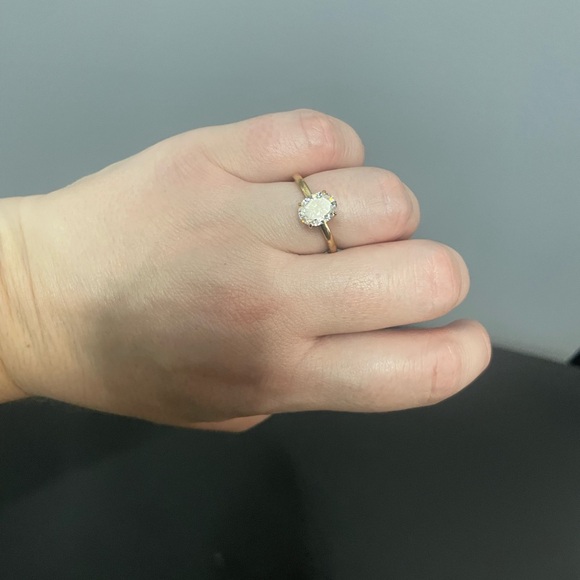 Jewelry - Elegant 10k Gold and Crushed Ice Oval Moissanite Ring